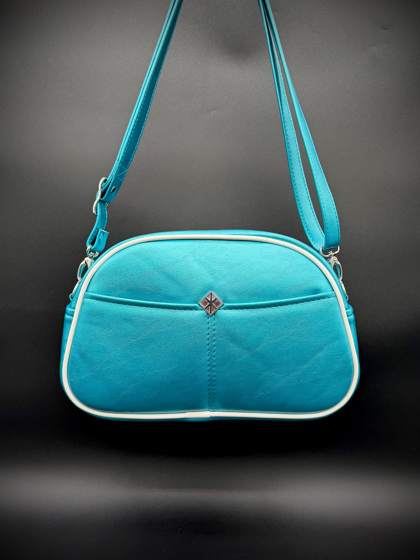 Moxie - Printed LEATHER and Turquoise Pearl Vinyl